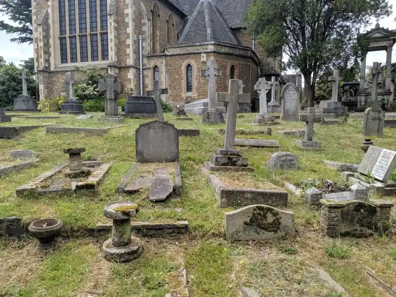 Cross tombstone on cemetery, London